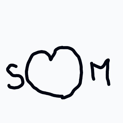 A heart shaped drawing with the word "M" written inside it.