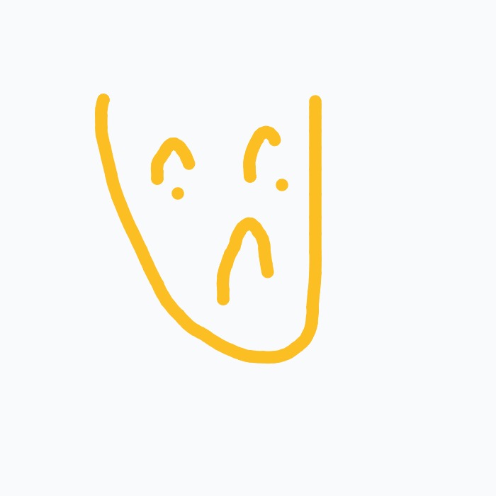 A yellow drawing of a face with a sad expression.